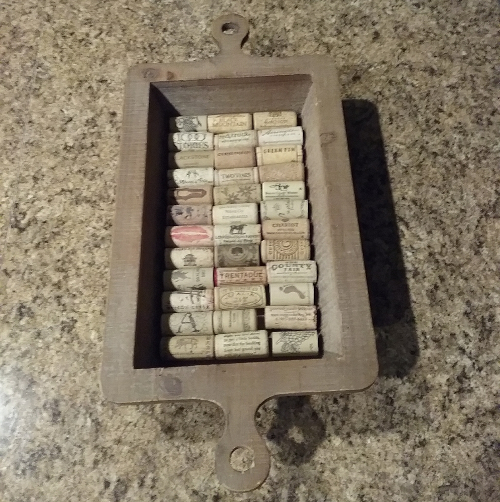 Wood tray with wine cork bottom